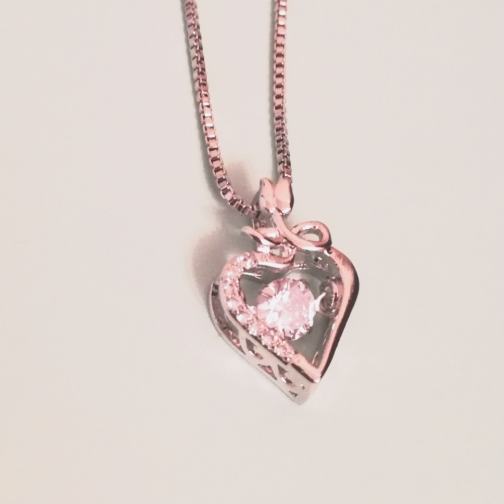 Heart Pendant Necklace. Dancing Zirconia Stone.